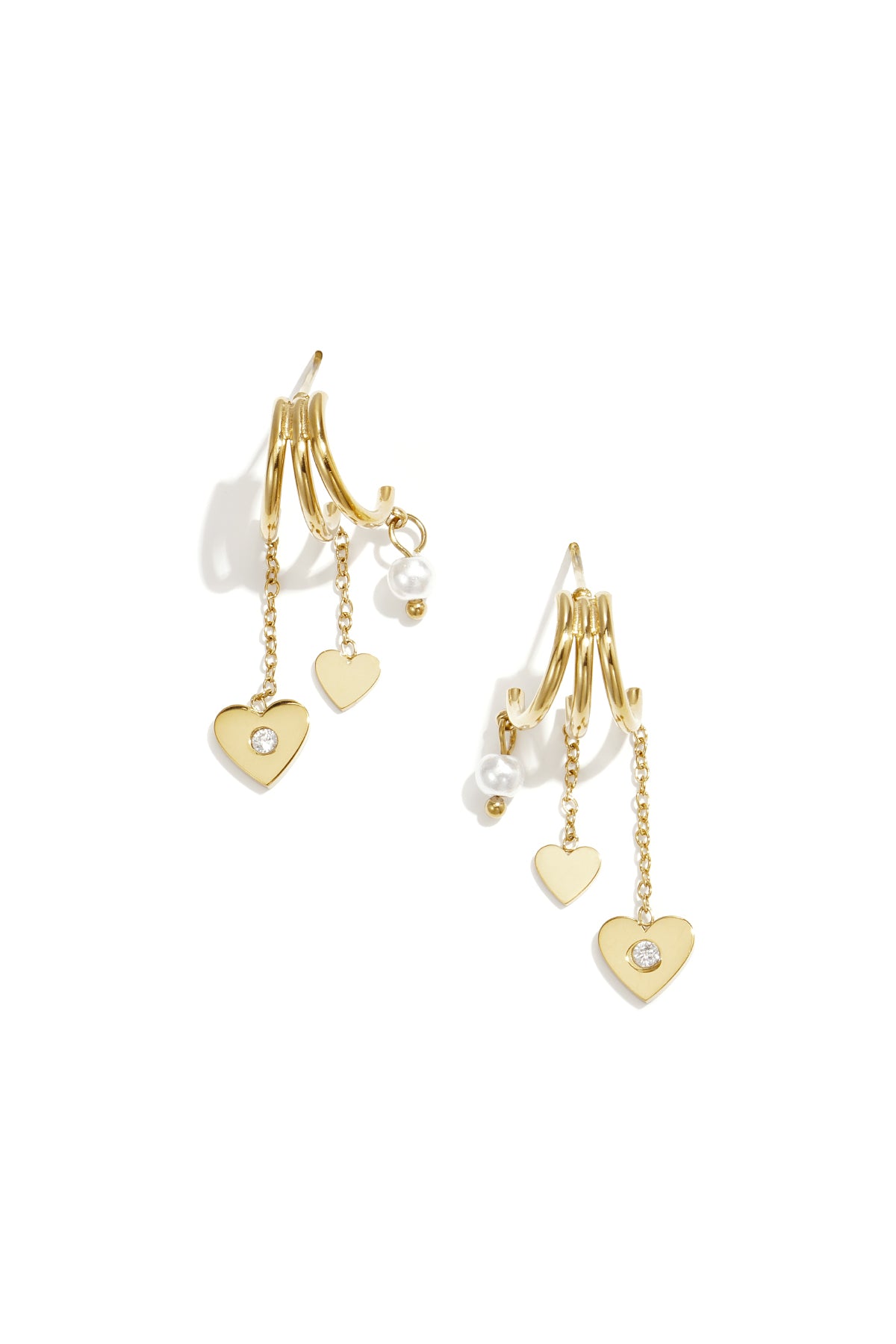 Triple earrings with heart pendants and pearl