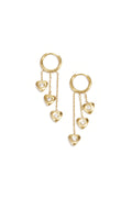 Earrings with dangling hearts at different heights