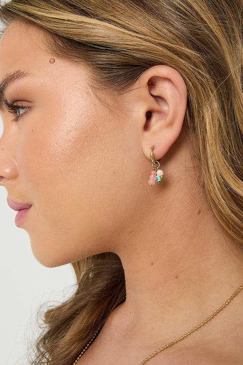 Earrings with hanging beads